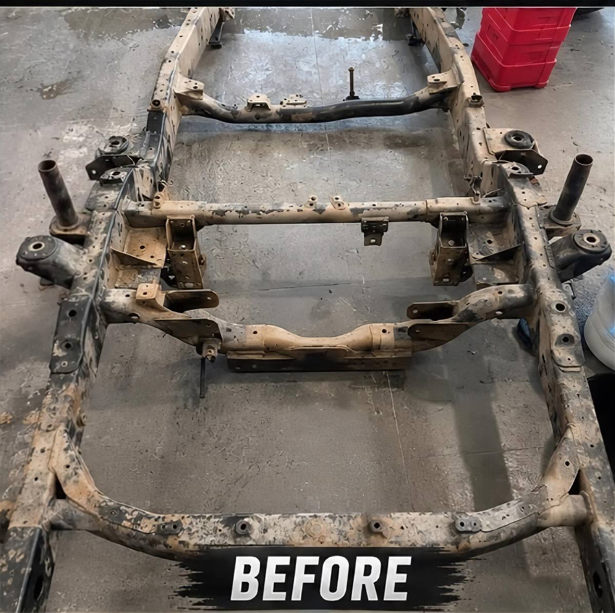 Rusted bakkie ladder chassis covered in corrosion before dry ice blasting