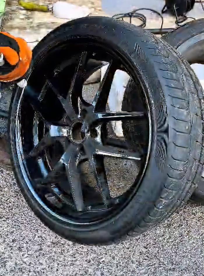 Gloss black alloy rim cleaned by dry ice blasting